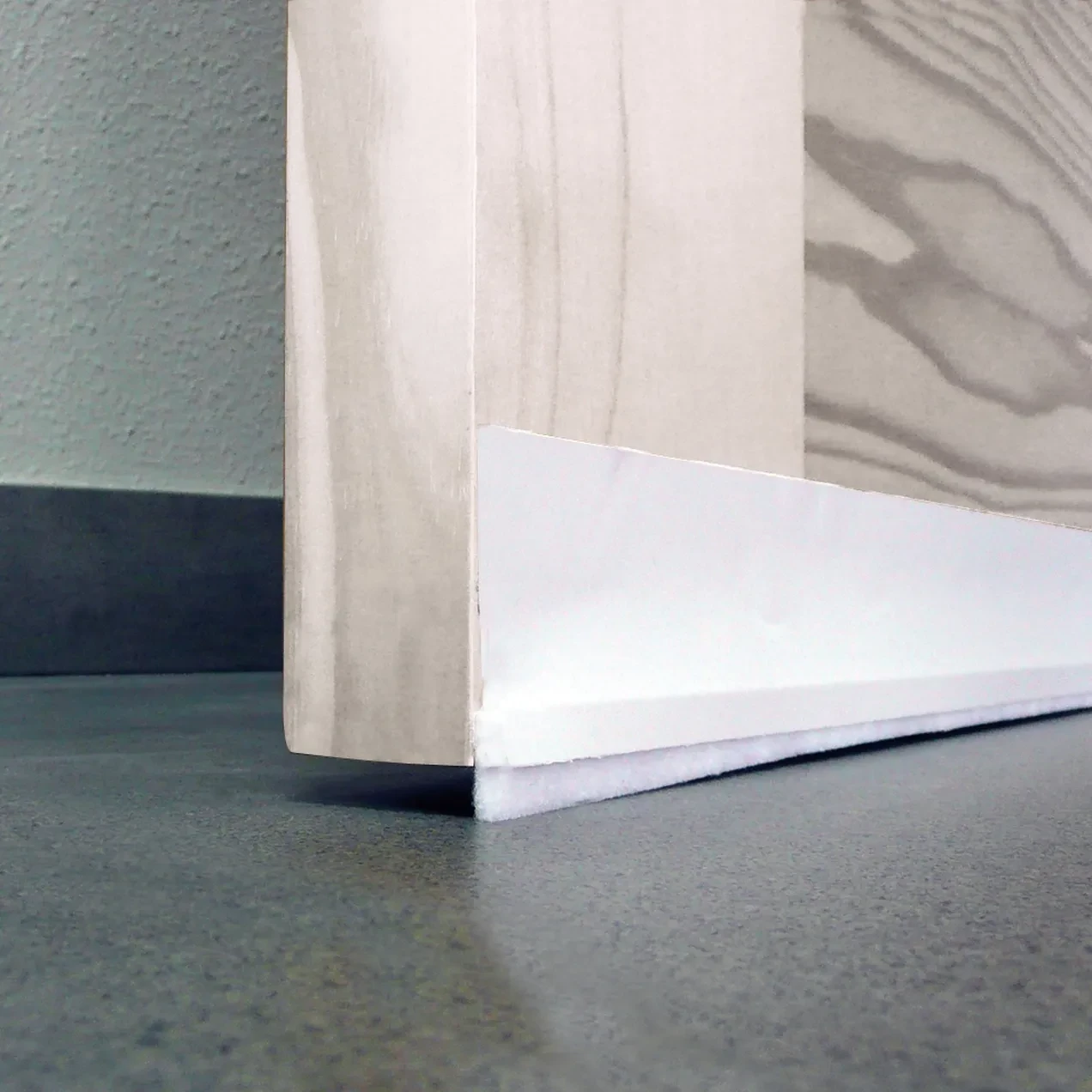 Imagen de BR BURLETE PVC BAJO PUERTA FLEXIBLE 1MT BLANCO BR BURLETE PVC BAJO PUERTA FLEXIBLE 1MT BLANCO